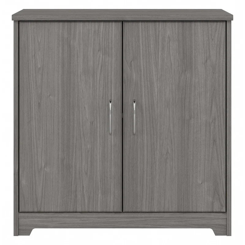 Petit meuble de rangement à 2 portes avec étagère réglable et poignées métalliques