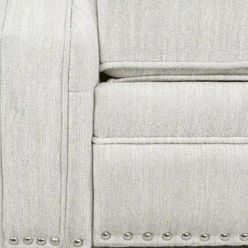Fauteuil inclinable contemporain à dossier poussoir capitonné avec garniture cloutée