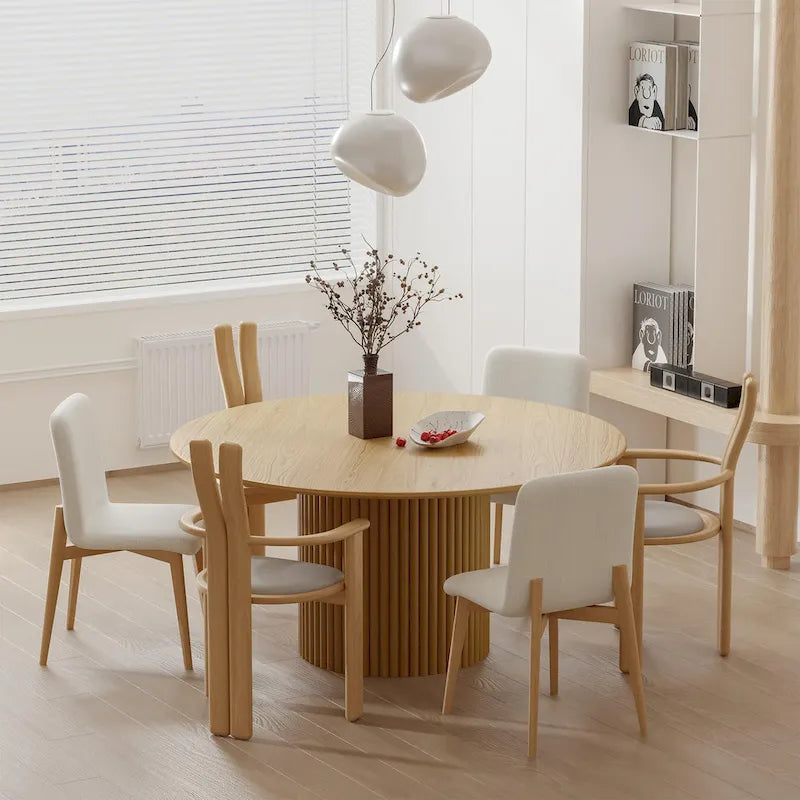 Table à manger ronde en chêne massif avec piètement central cannelé, finition bois noir ou naturel